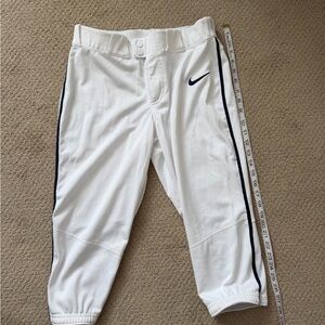 Nike softball pants. Has belt loops and 2 back pockets